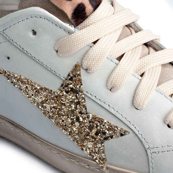 Sneaker in pelle bianca con stella glitter e dettaglio animalier Donna
