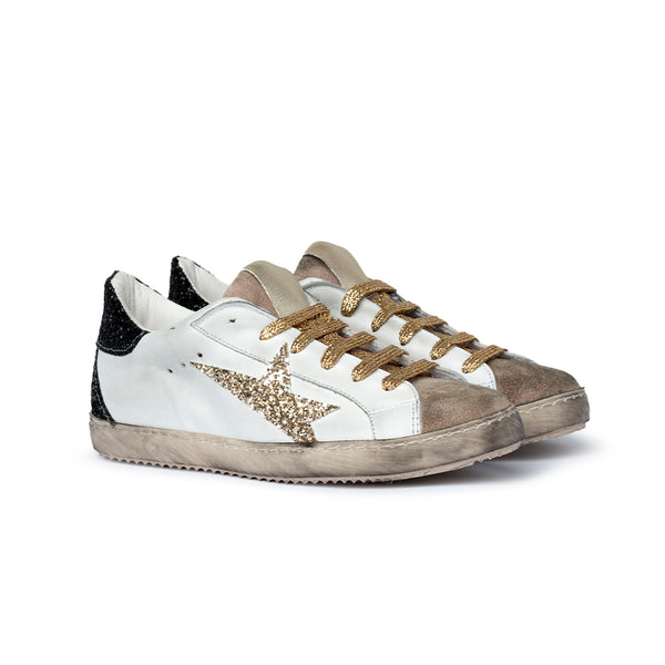 Sneaker in pelle bianca con stella glitter Donna