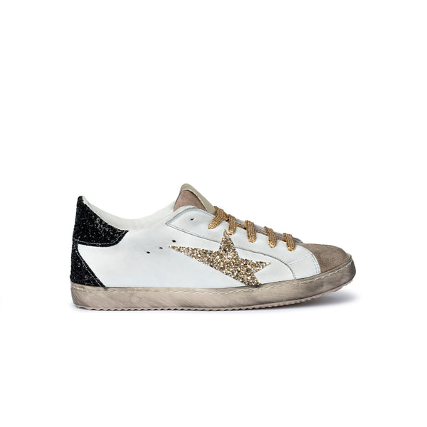 Sneaker in pelle bianca con stella glitter Donna