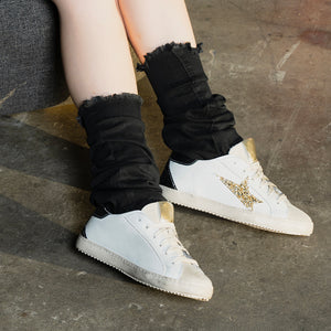 Sneaker in pelle bianca con stella glitter Donna