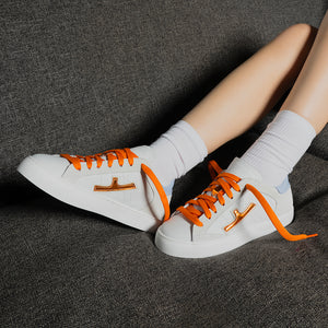 Sneaker in pelle bianca con dettagli e lacci oro e azzurro Donna